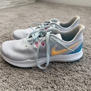 Nike Gray Sneakers with Yellow and Blue Details
